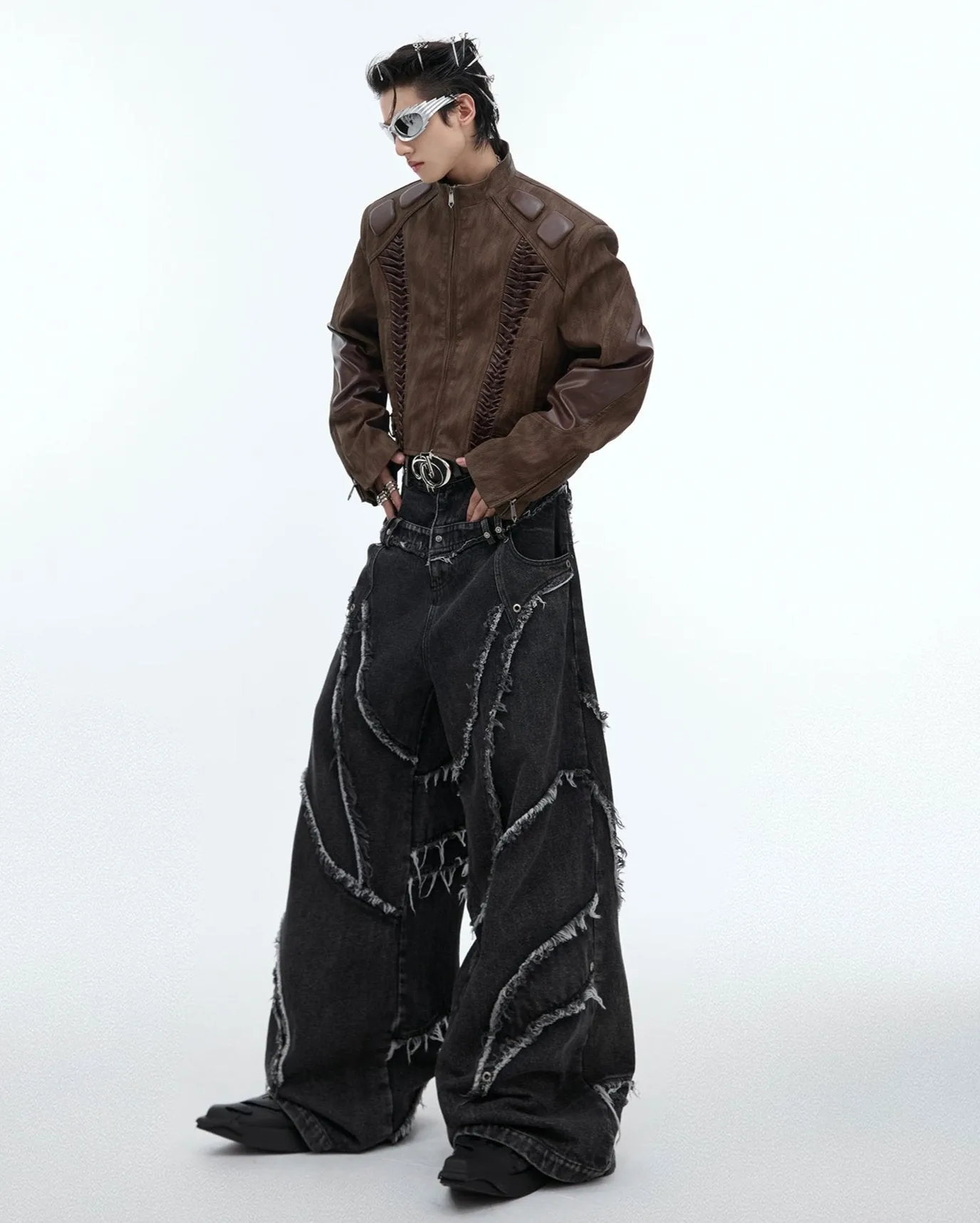 Distressed Paneled Jeans with Raw Edges and Washed Finish
